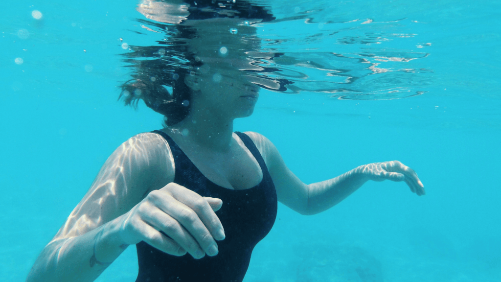 Woman underwater in a relaxation state.